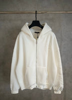 White zip-up hoodie with hood, full-length front zipper and front kangaroo pocket