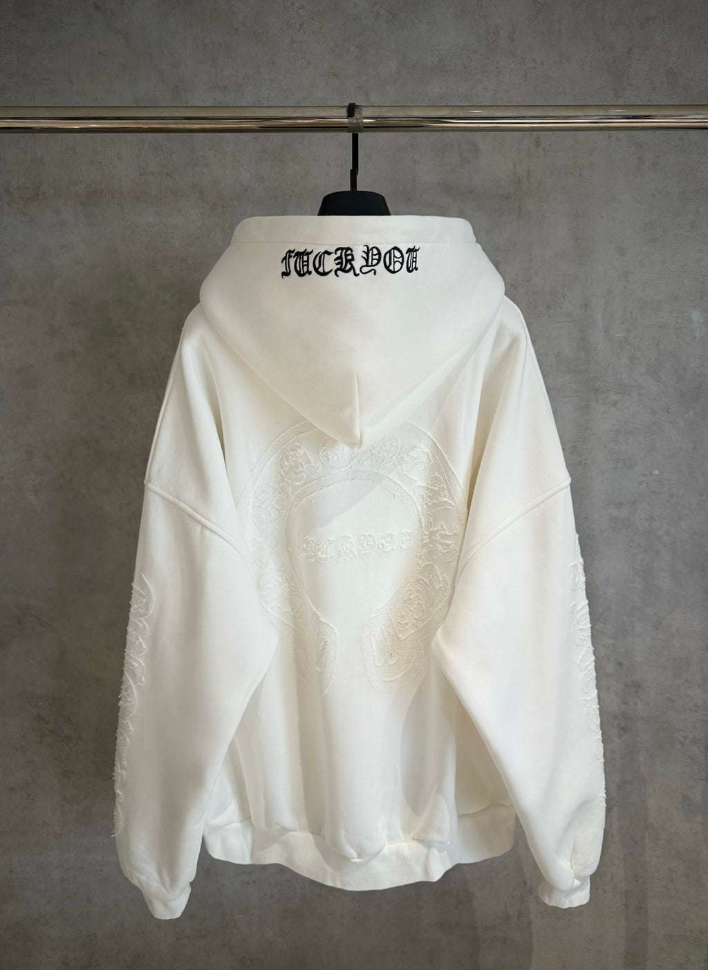 White zip-up hoodie with hood, back graphic print and ribbed hem