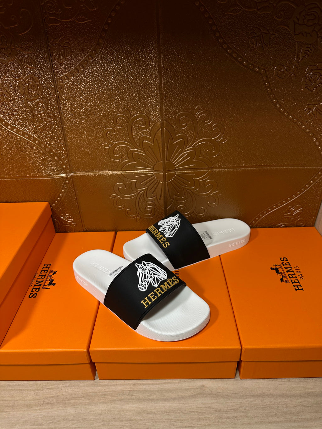 Hermes slide sandals, black band with white emblem over contoured white footbed