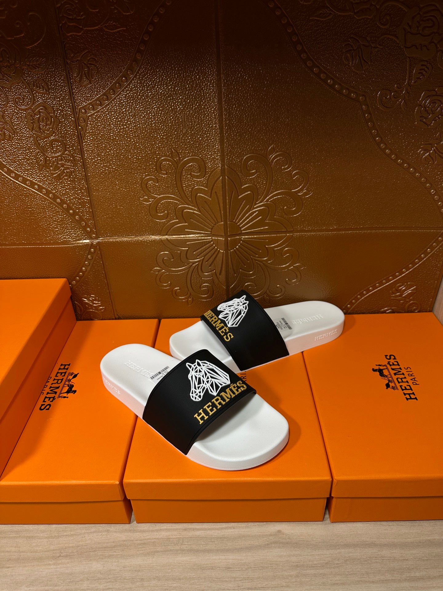 Hermes slide sandals, black band with white emblem over contoured white footbed