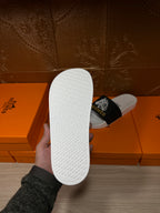 Hermes slide sandal outsole, textured white rubber sole underside