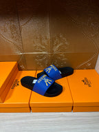 Hermes slide sandals, single pair view with blue strap and black rubber sole