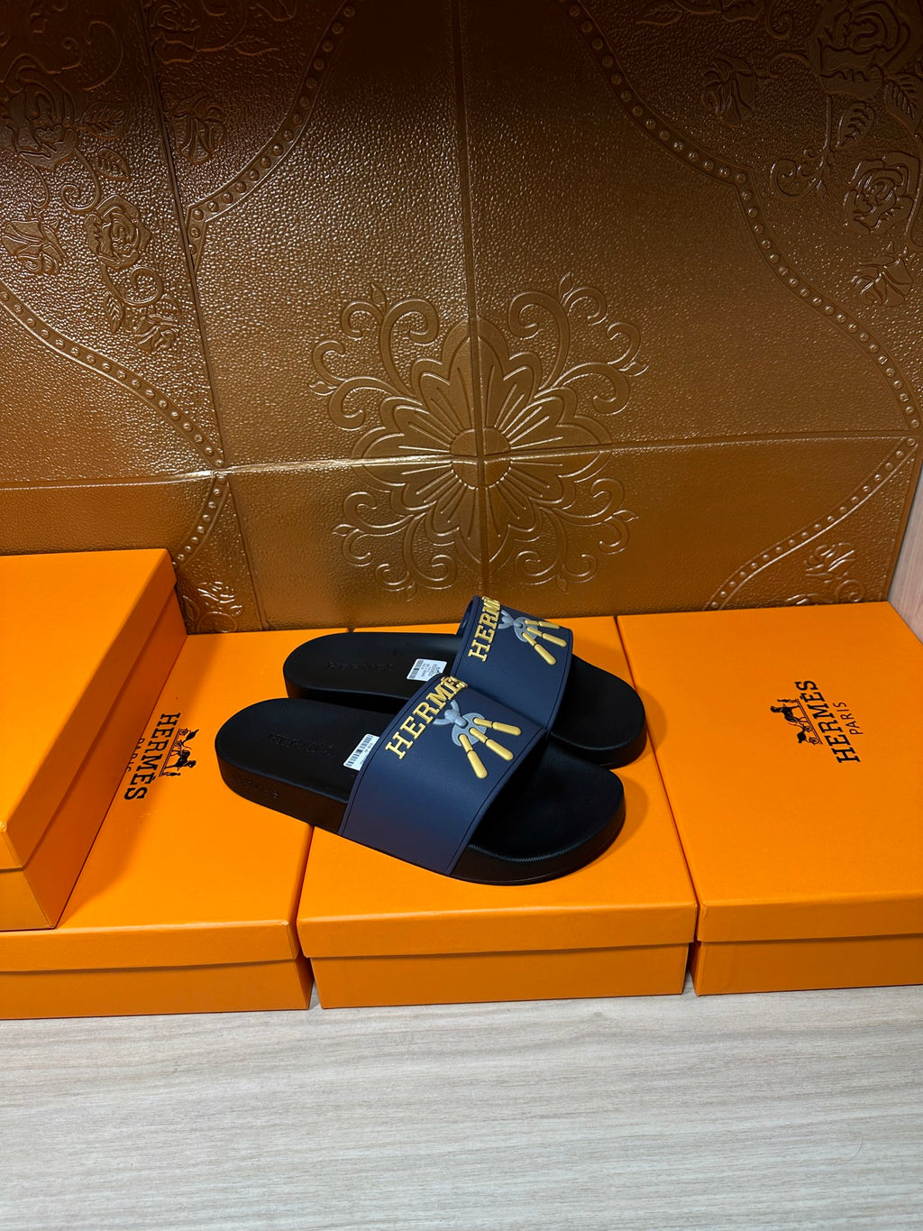 Hermes slide sandals, blue logo strap over black slide sole