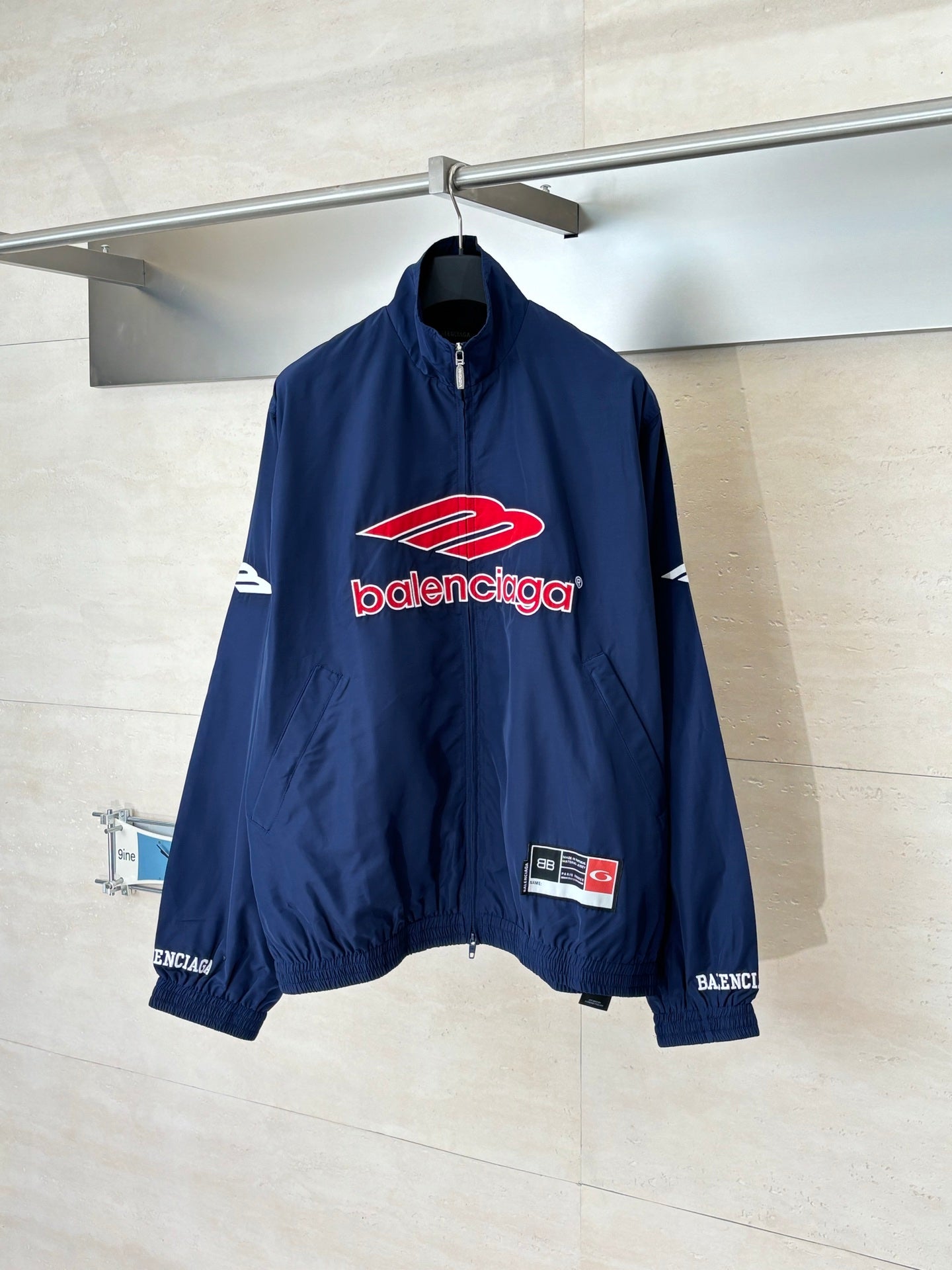 Balenciaga navy zip-up windbreaker jacket with stand collar and logo patch