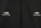 Black pants with Balenciaga logo print on side