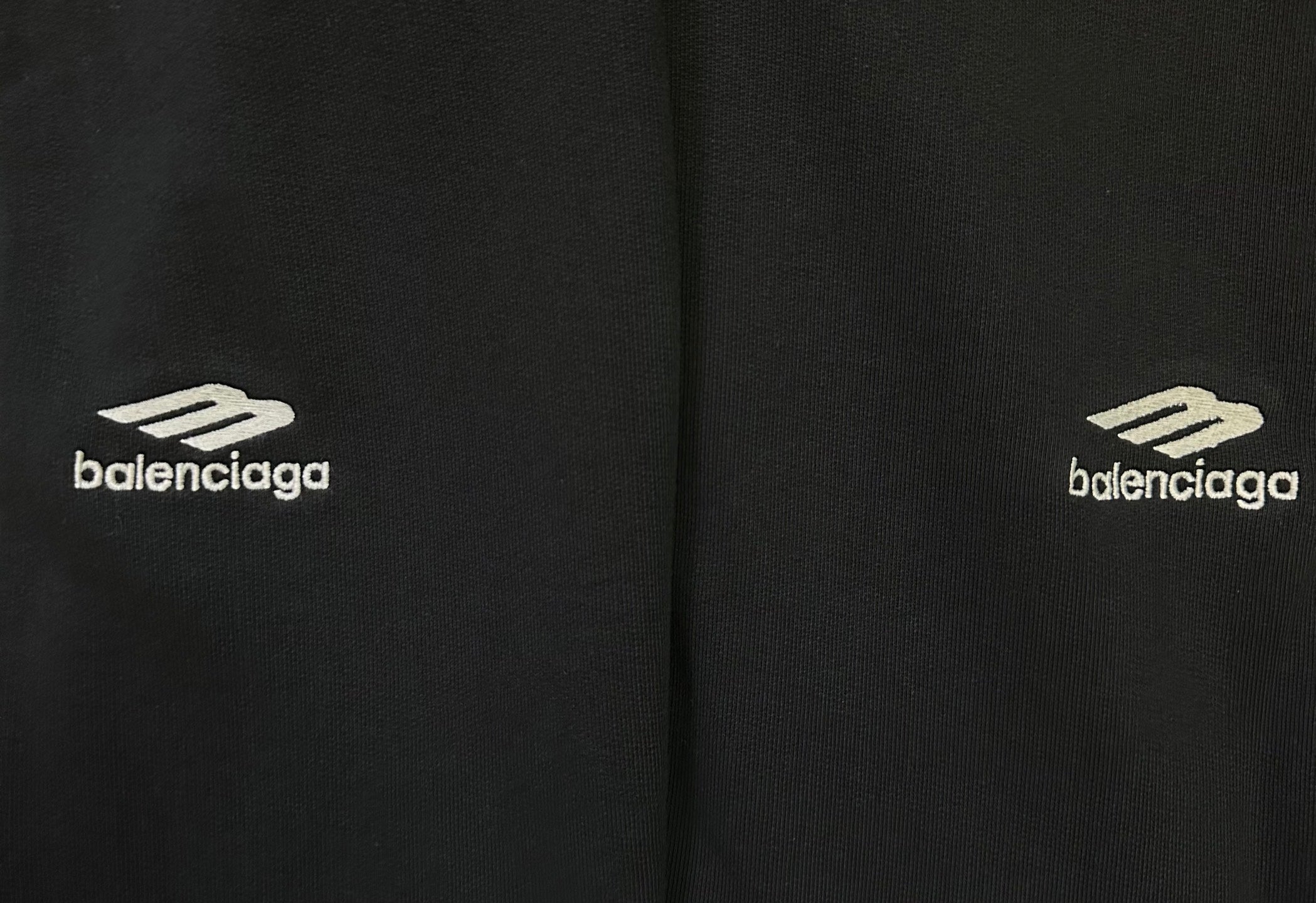 Black pants with Balenciaga logo print on side