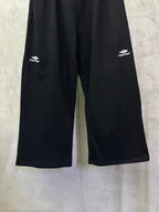 Black wide-leg pants with Balenciaga logos on back