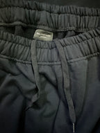 Black drawstring pants with Balenciaga size label inside waistband