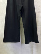 Black wide-leg pants with relaxed straight legs