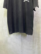 Black Balenciaga T-shirt hem and sleeves, side view with loose draped fit