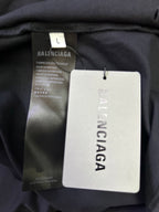 Balenciaga T-shirt showing size L tag and hanging product label