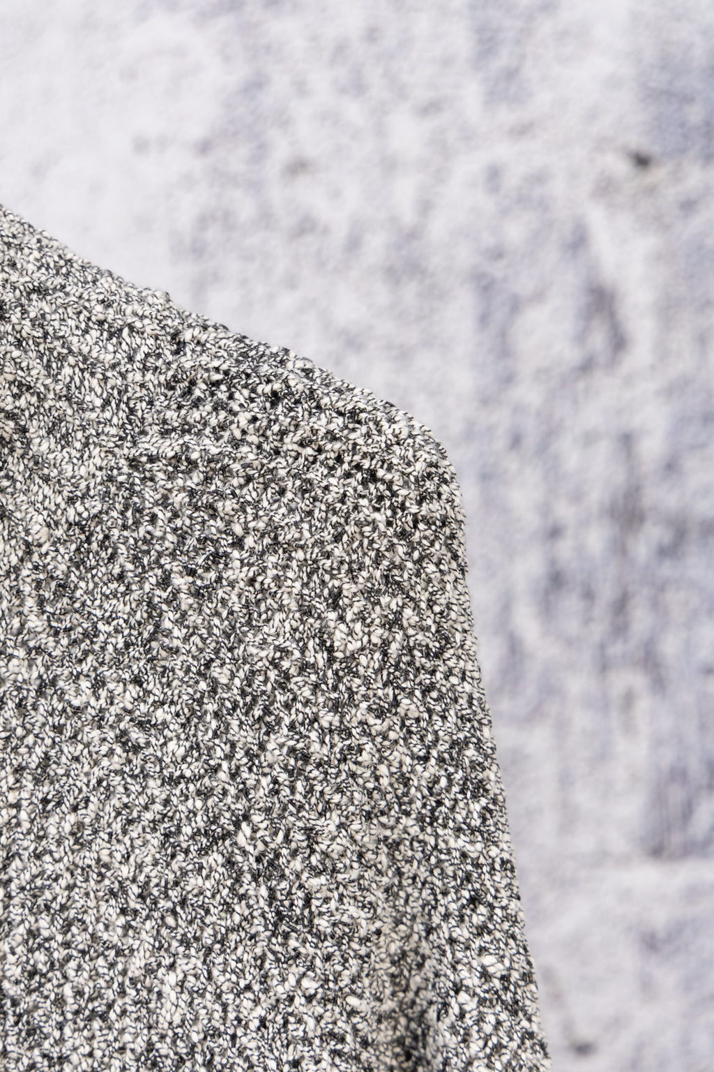 Stone Island speckled knit jacket fabric texture, side close-up