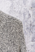 Stone Island speckled knit jacket fabric texture, side close-up
