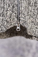 Stone Island speckled knit jacket zipper and metal pull tab, close-up