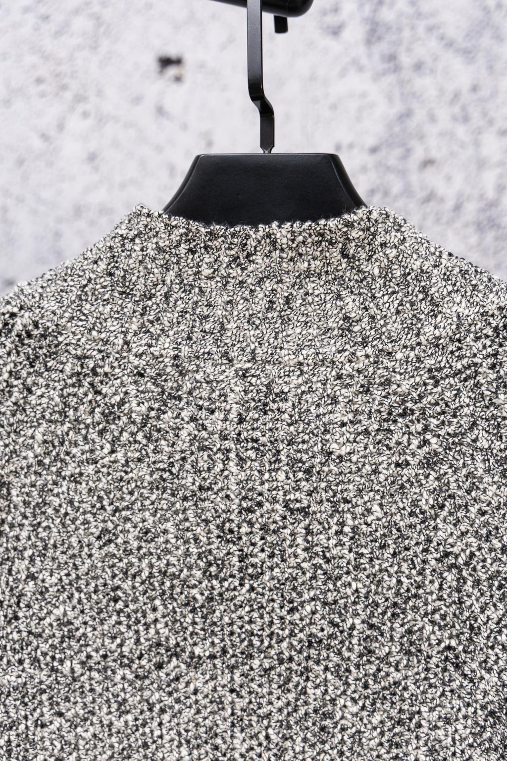 Stone Island speckled knit jacket neckline and stand collar, close-up