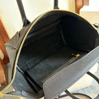 Celine handbag open interior with dark lining and top-zip closure