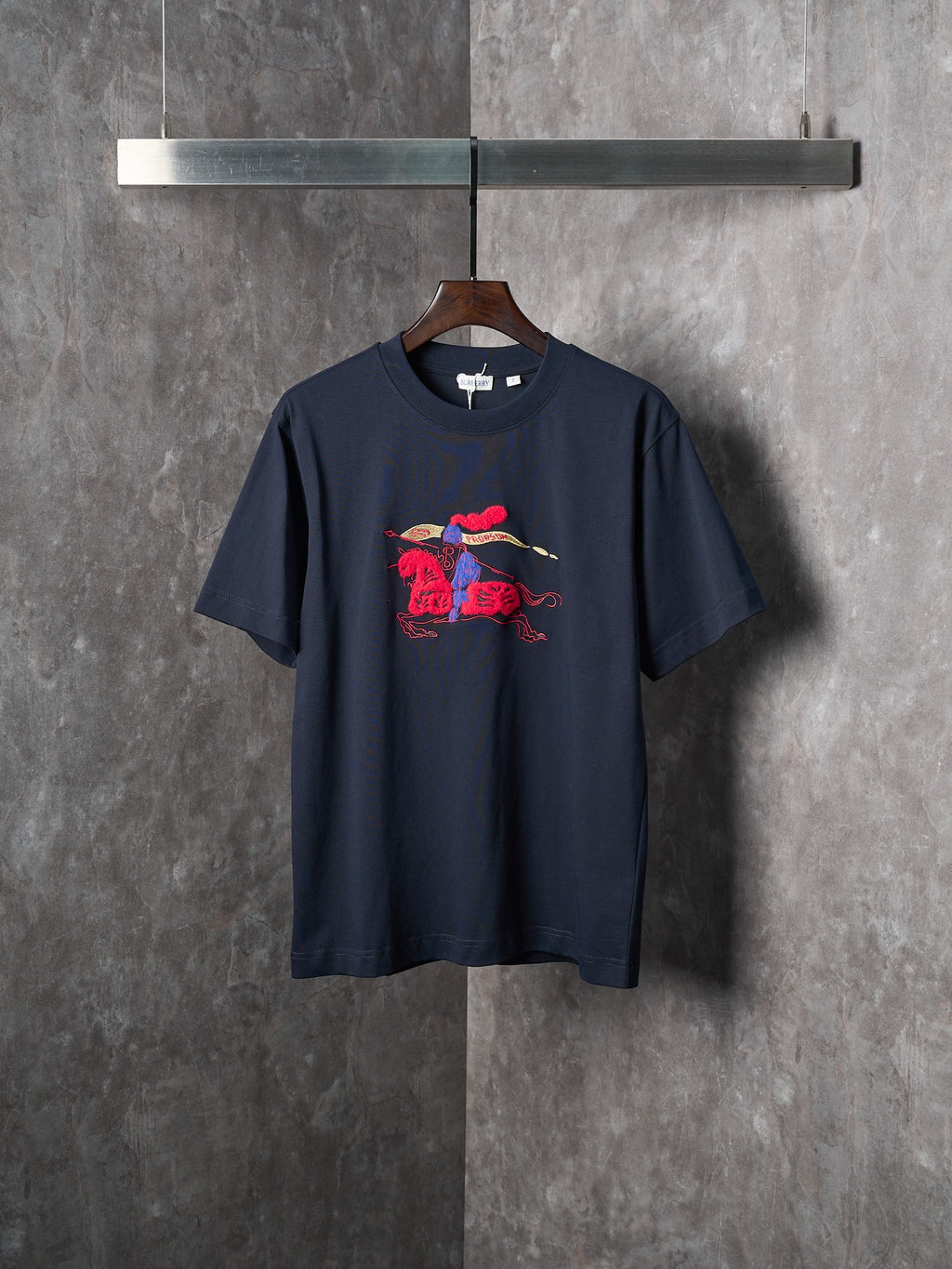 Navy crew-neck short-sleeve T-shirt with colorful animal graphic on chest