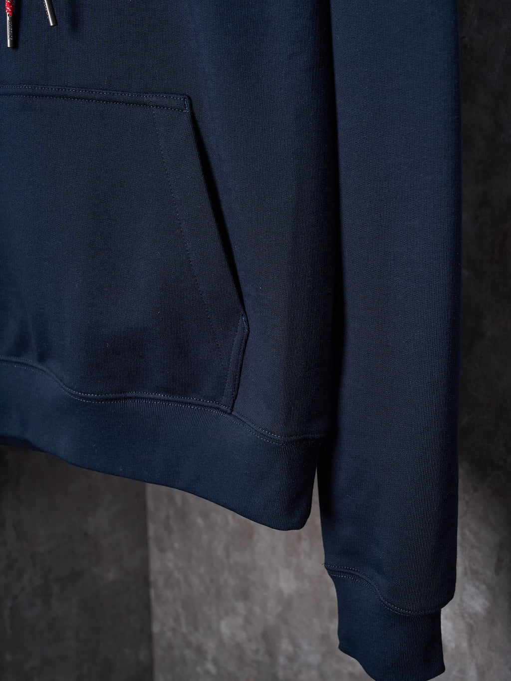 Navy hoodie front pocket and hem with long sleeves