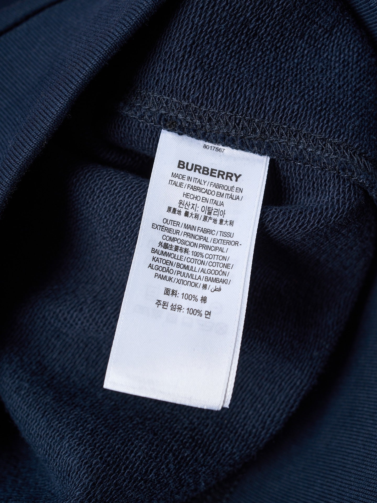 Navy hoodie interior care label with BURBERRY branding