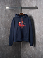 Navy pullover hoodie with embroidered red graphic and kangaroo pocket