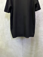 Black T-shirt back view with relaxed fit and short sleeves