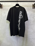 Black T-shirt with white script logo on the front, short sleeves, crew neck