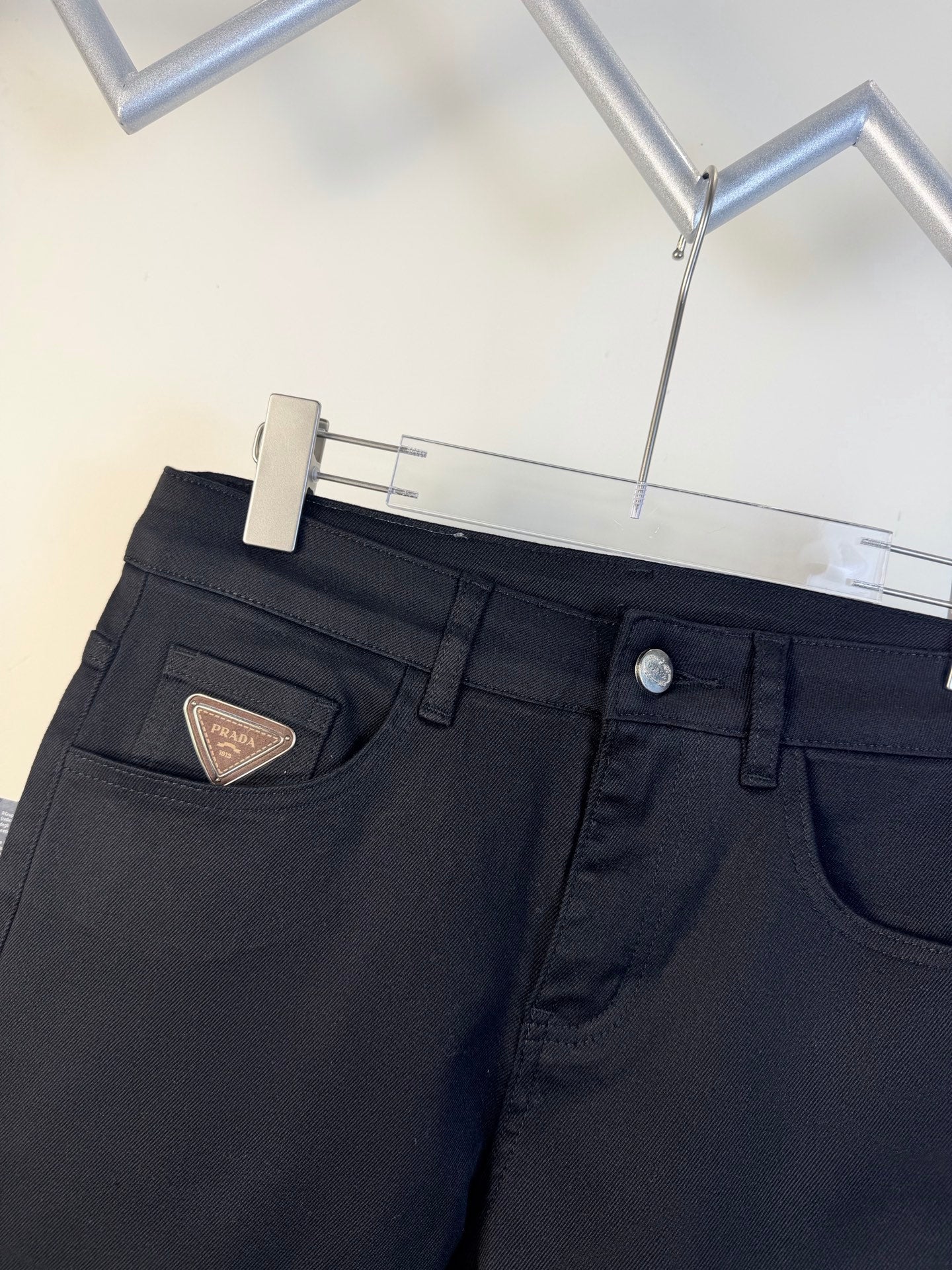 Prada pants waistband with logo patch and belt loops, dark blue