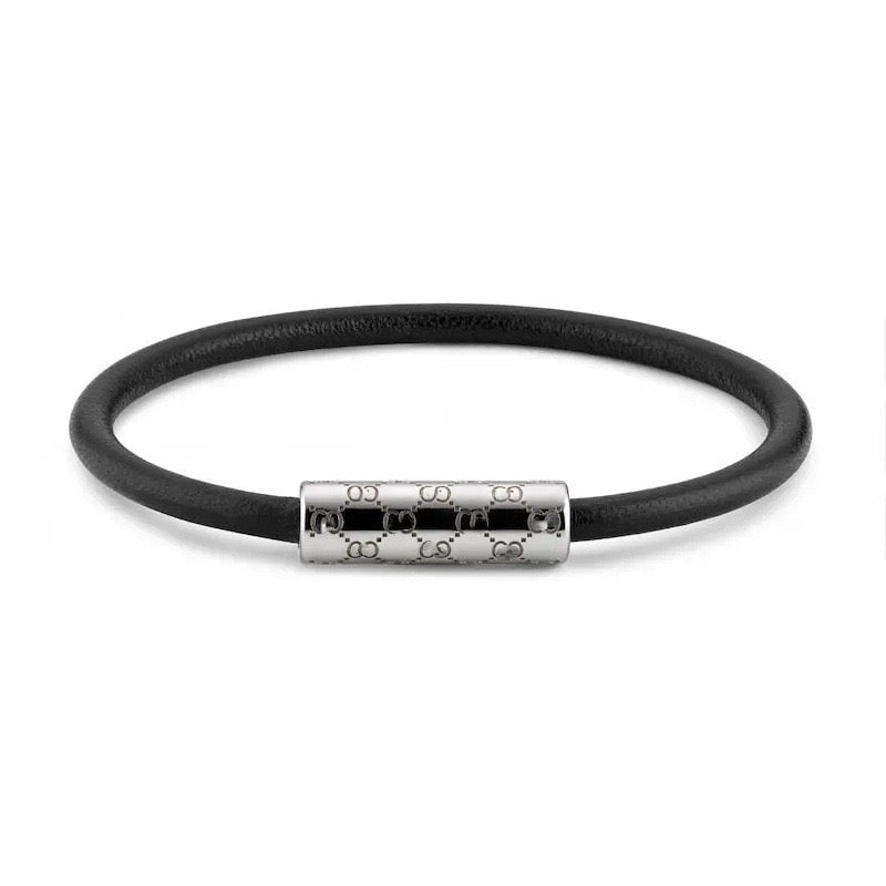 Gucci elastic bracelet in black with silver-tone logo bar clasp
