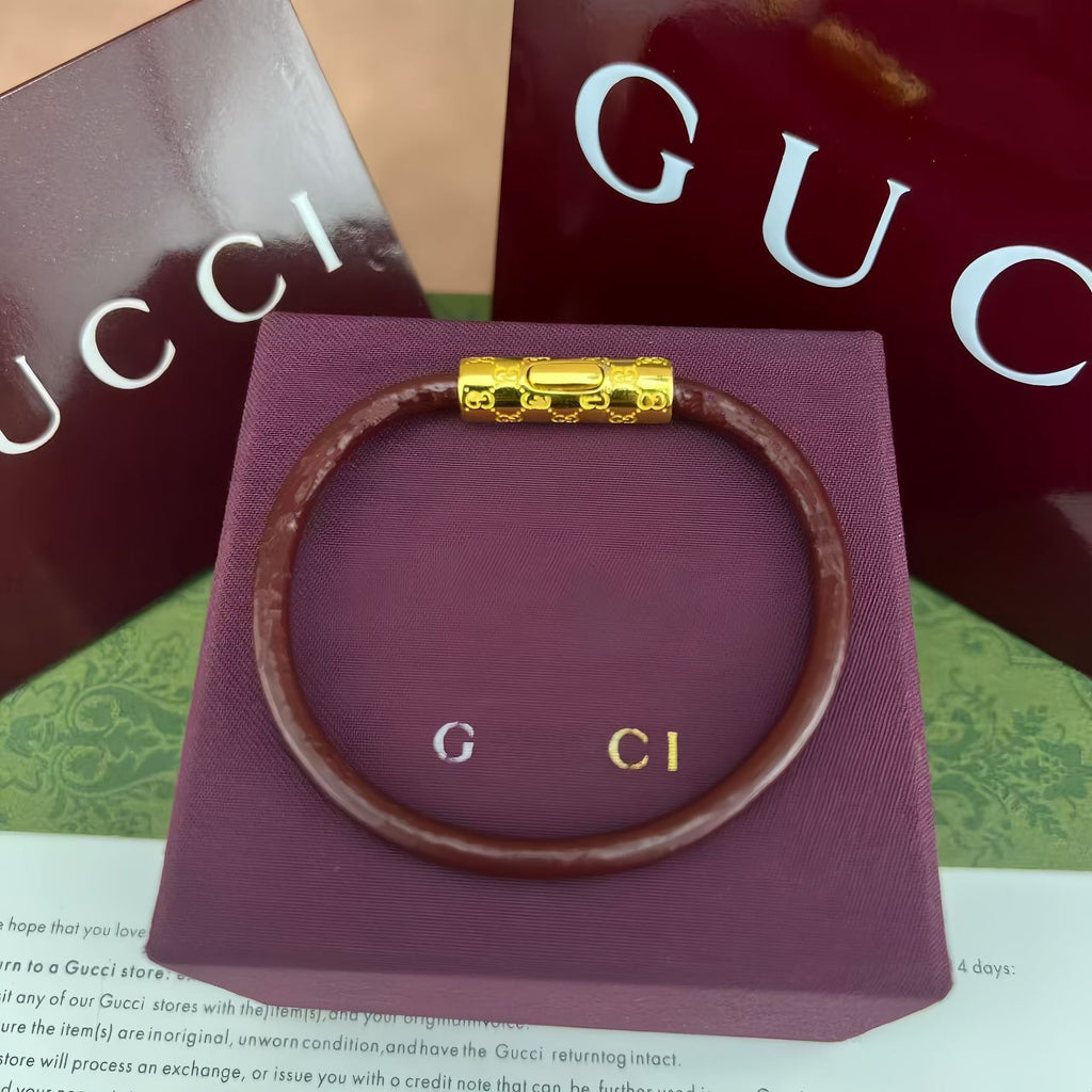 Gucci bangle bracelet, purple leather, gold logo clasp with monogram detail