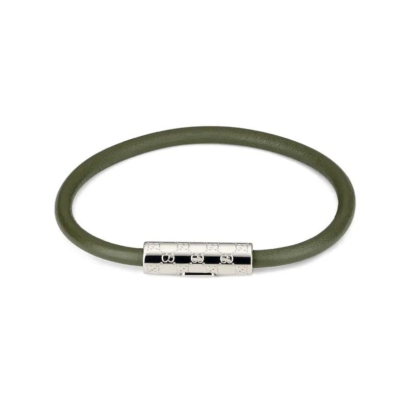 Gucci leather bracelet in olive green with silver logo bar centerpiece and studs