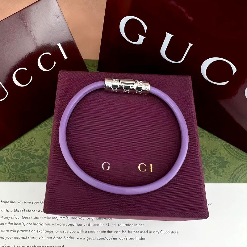 Gucci elastic bracelet in lavender with silver-tone logo bar clasp