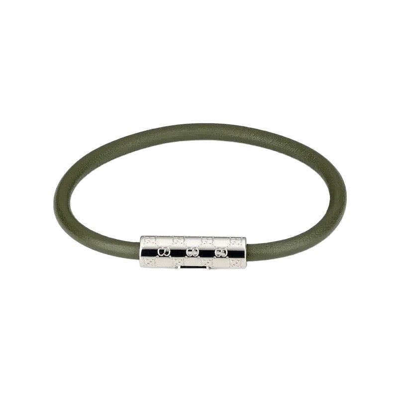 Gucci leather bracelet in olive green with silver logo bar and dark inlay