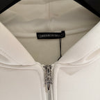 White hoodie lining with neck label and metal zipper pull