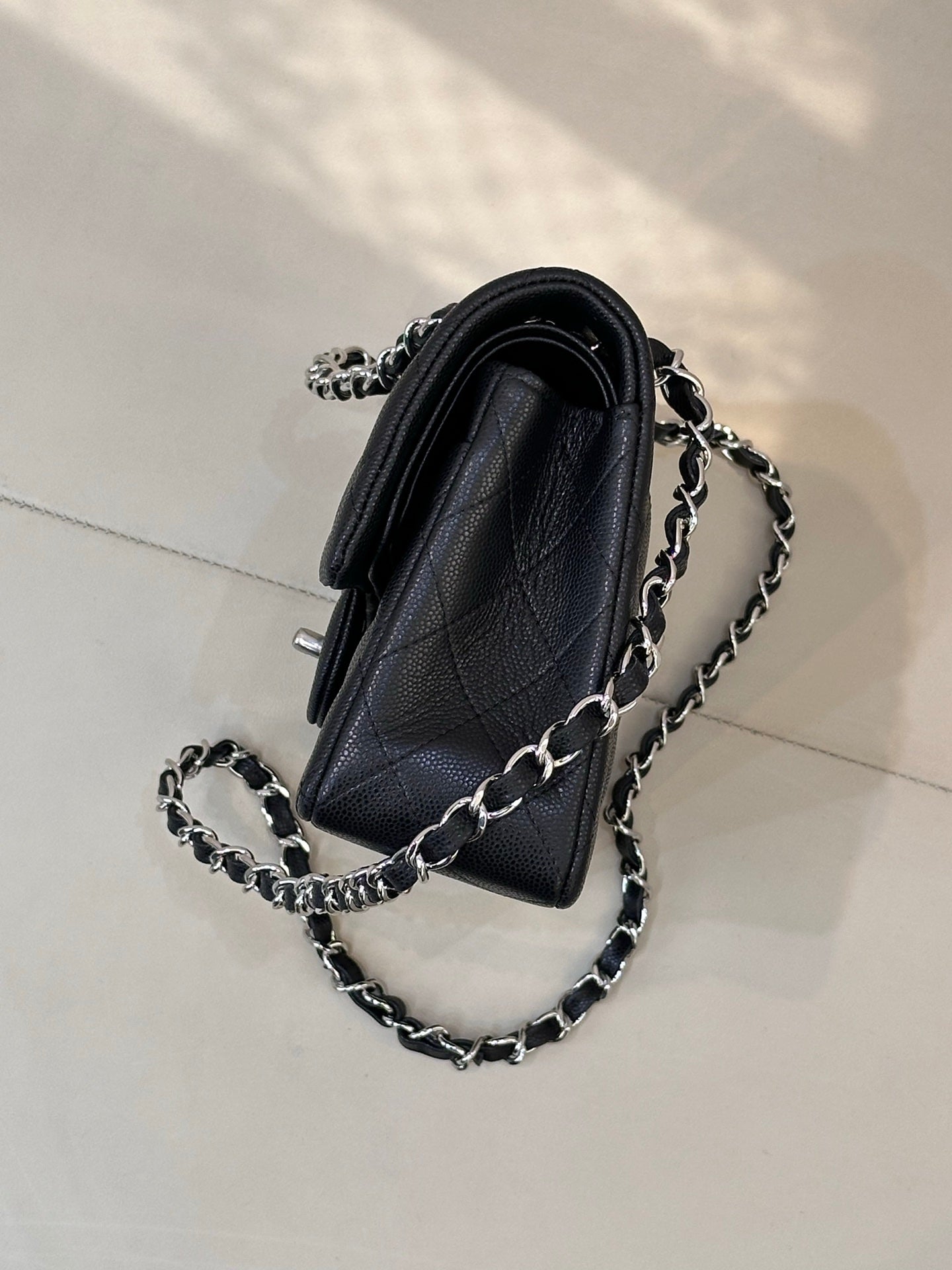 Chanel quilted mini shoulder bag with chain strap and metal ring hardware