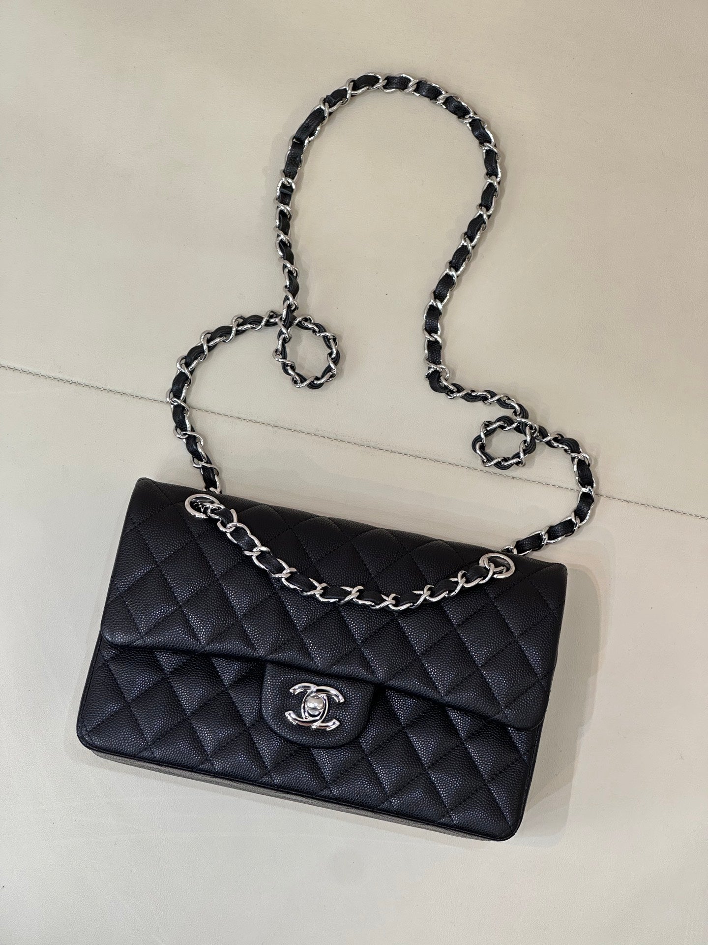 Chanel quilted shoulder bag with chain strap, front flap and CC logo
