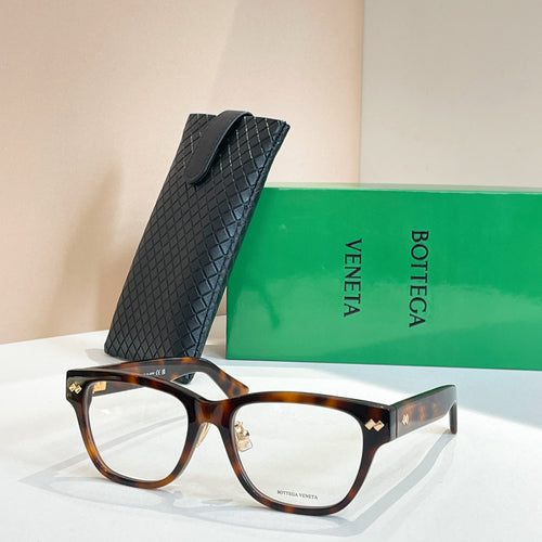 Bottega Veneta tortoiseshell eyeglasses with black temples and gold logo accents