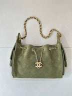 Chanel mini handbag in olive green with gold chain strap and two side tab pockets