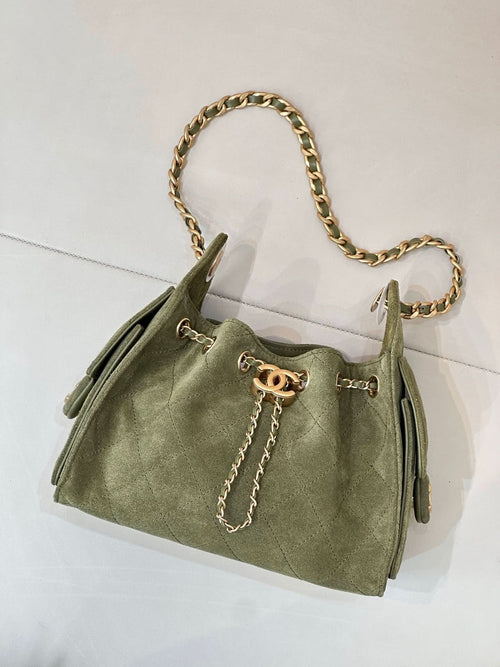 Chanel mini handbag in olive green with gold chain handle and front clasp detail