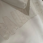 Balenciaga long hoodie with raised embroidered logo lettering on front panel