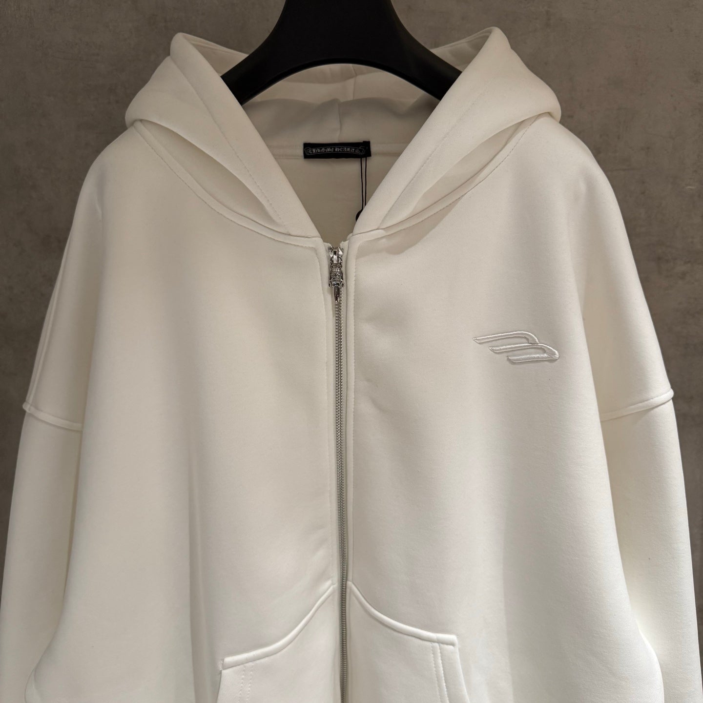 Balenciaga long hoodie, white zip-up hood with small chest logo detail