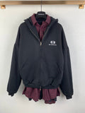 Balenciaga zip-up hooded jacket with logo patch, kangaroo pocket, and plaid inner layer hem