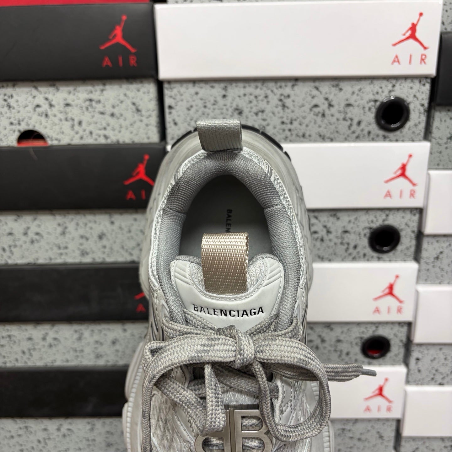 Balenciaga unisex sneakers, back view with “BALENCIAGA” logo on tongue area