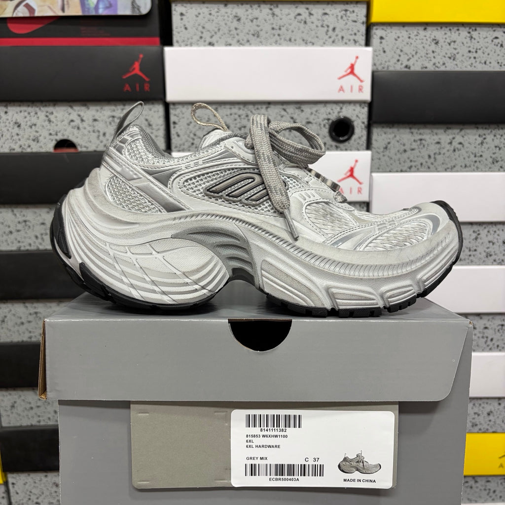 Balenciaga unisex chunky sneakers with light gray mesh panels and lace-up closure