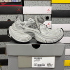 Balenciaga unisex chunky sneakers with light gray mesh panels and lace-up closure