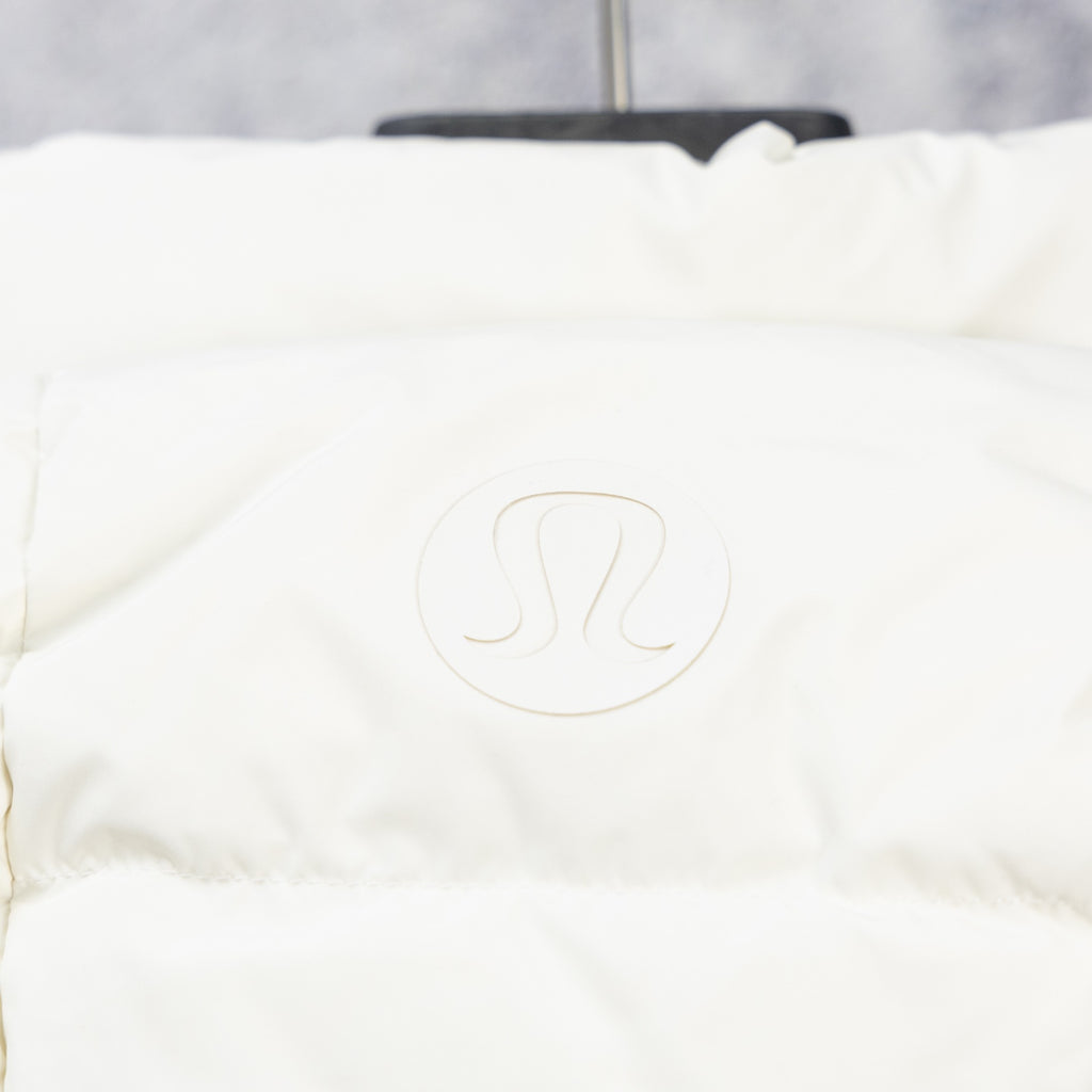 Ralph Lauren white puffer vest with embossed SL-style logo