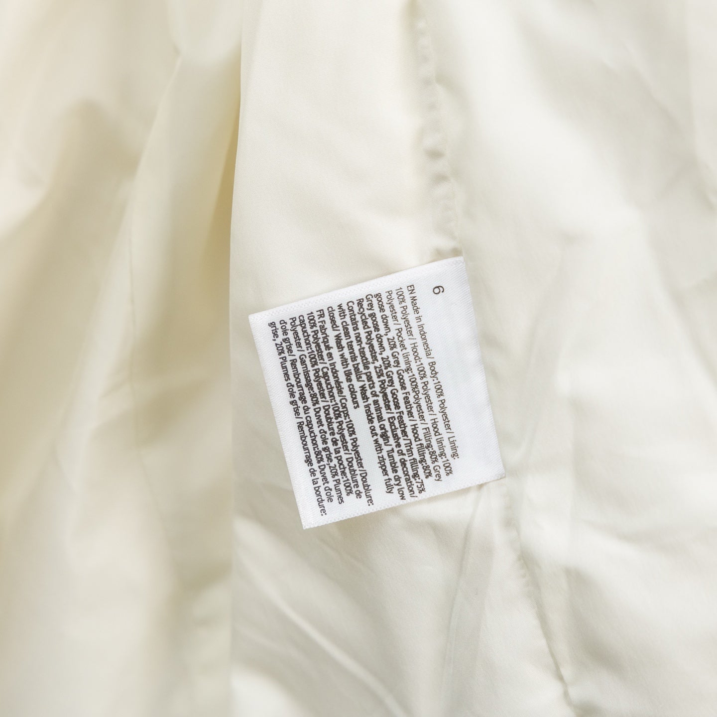 Ralph Lauren white puffer vest label at inner side seam