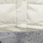 White puffer jacket center front panel with snap button and vertical seam