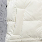 White puffer jacket side panel with quilted box stitching and seam lines