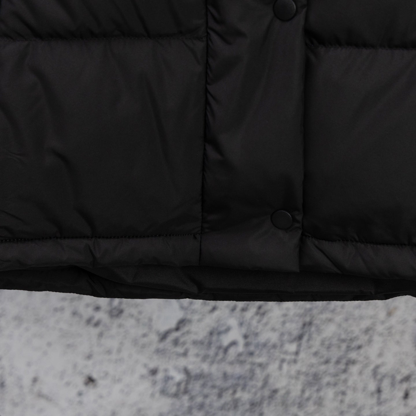 Ralph Lauren black puffer jacket interior placket with buttoned closure