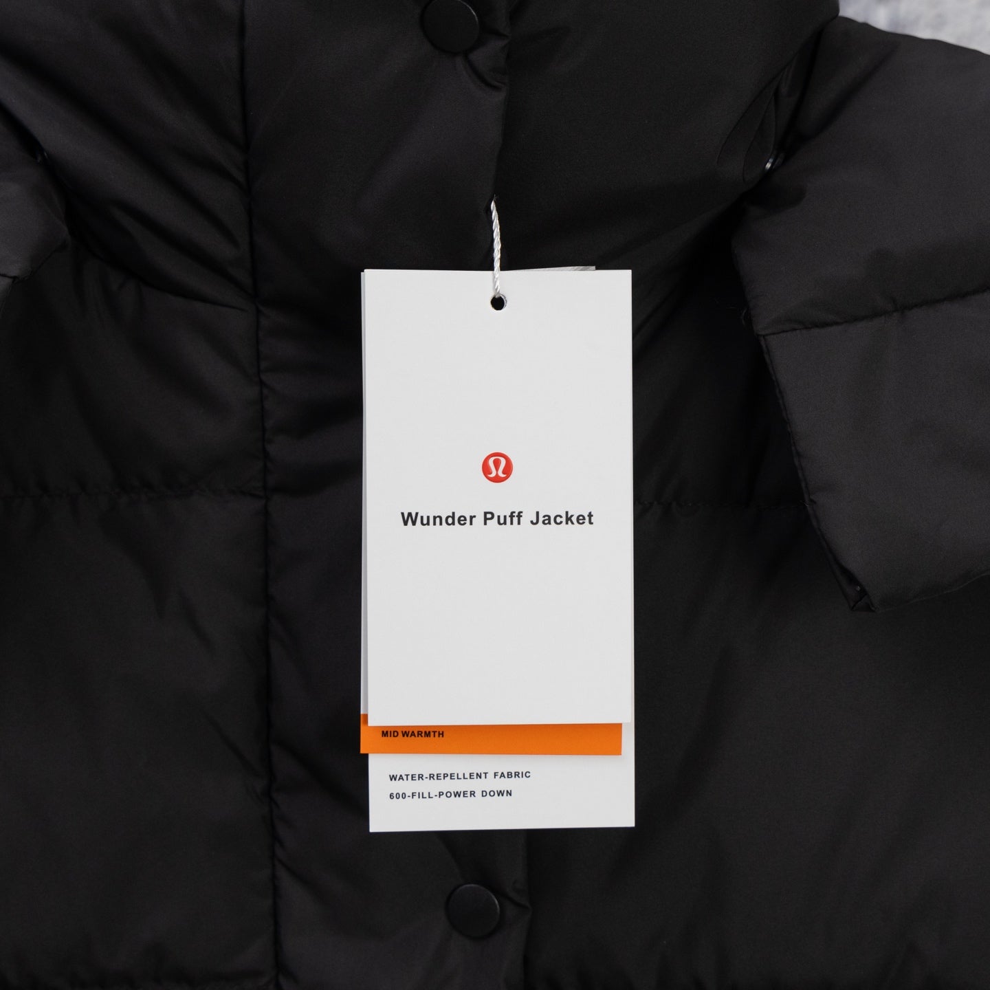 Ralph Lauren black puffer jacket front with neck and hanging tag
